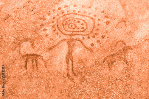 An image of ancient people and animals on the wall of the cave. ancient history, archeology. era.