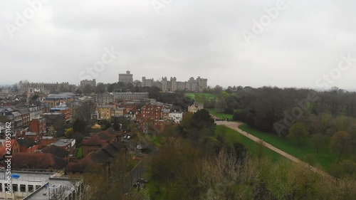 Aerial view of Berkshire, royal Windsor Castle on background - England, United Kingdom from above, 4k UHD photo