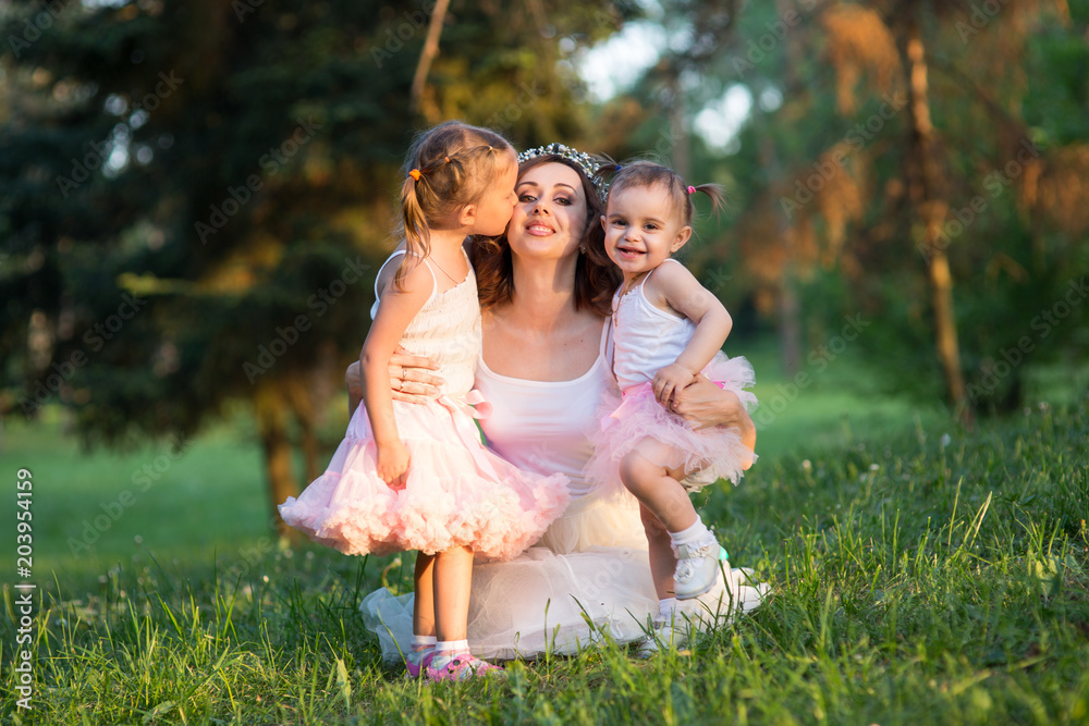 Fototapeta premium woman and children in nature