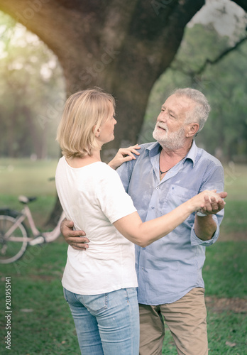 Senior couple in love relaxing in the park