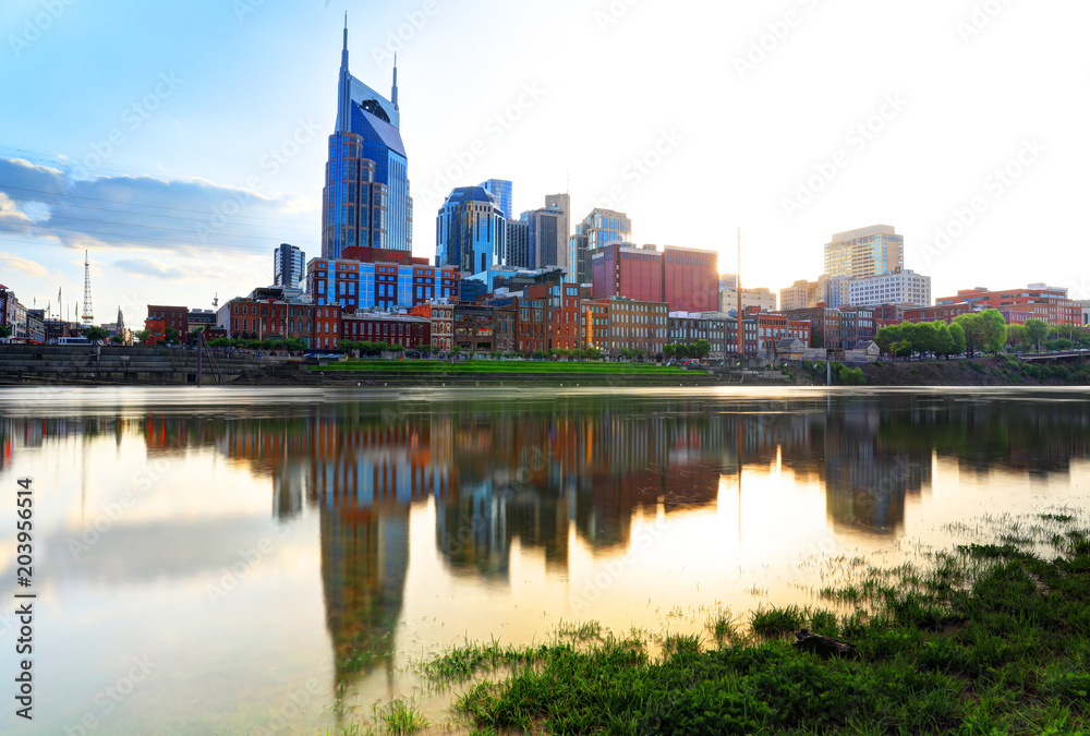 Nashville, Tennessee, USA downtown city skyline on the Cumberland River.