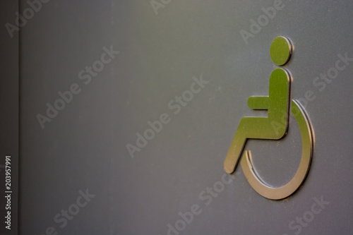 disabled sign on toilet door