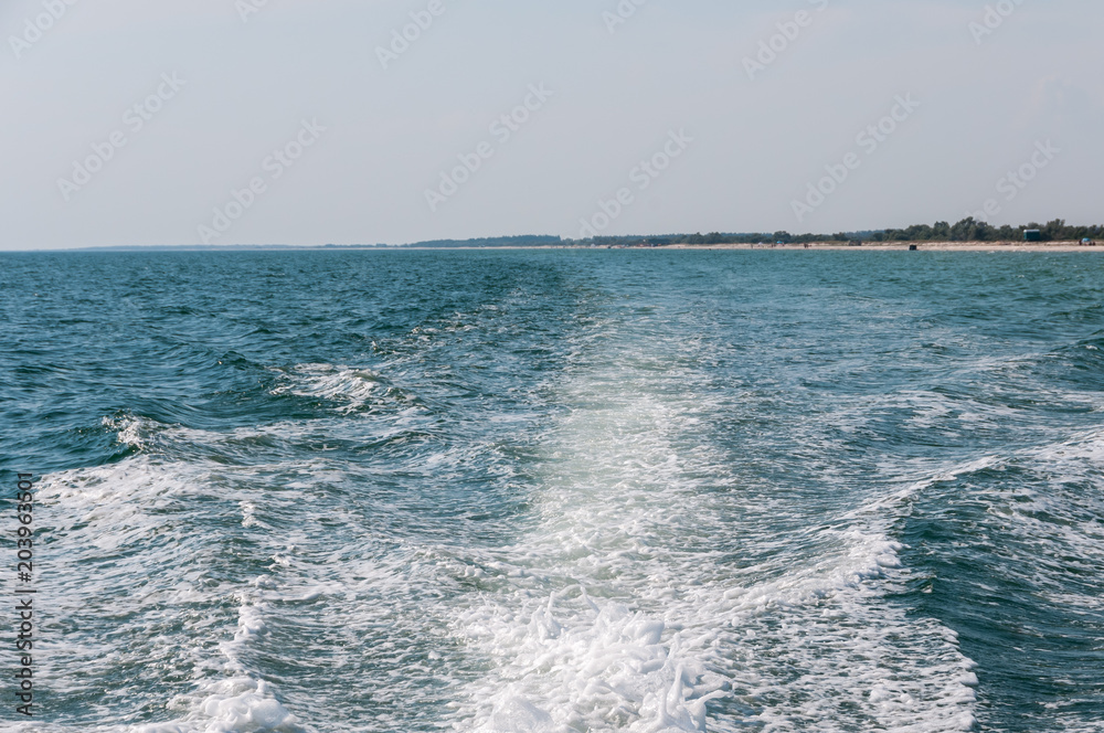 Seascape. Trace of the departing boat. Seascape. Trace of the departing boat.