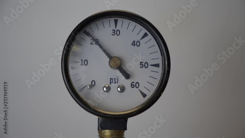 A pressure gauge showing building pressure