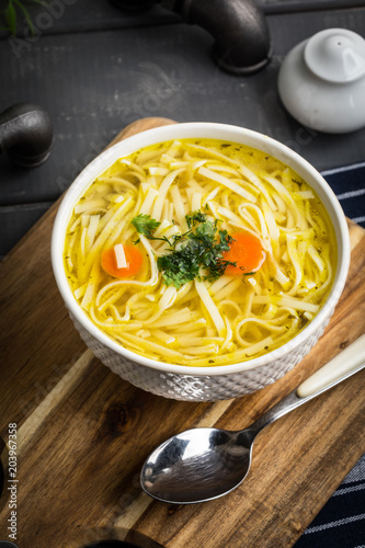 Tasty meat broth with noodles.