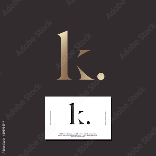 K letter. K monogram. Elegant gold monogram K with dot on a dark background. Original business card.