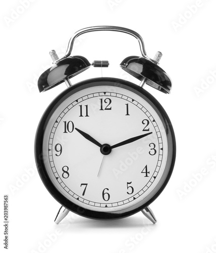 Alarm clock on white background. Time change concept