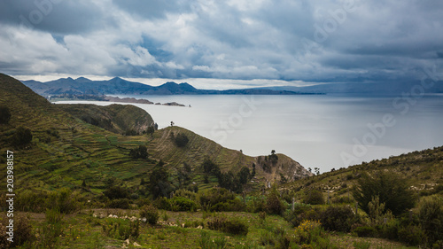 Isla del Sol panorama at the Titicaca lake in Bolivia  with storm aproaching photo