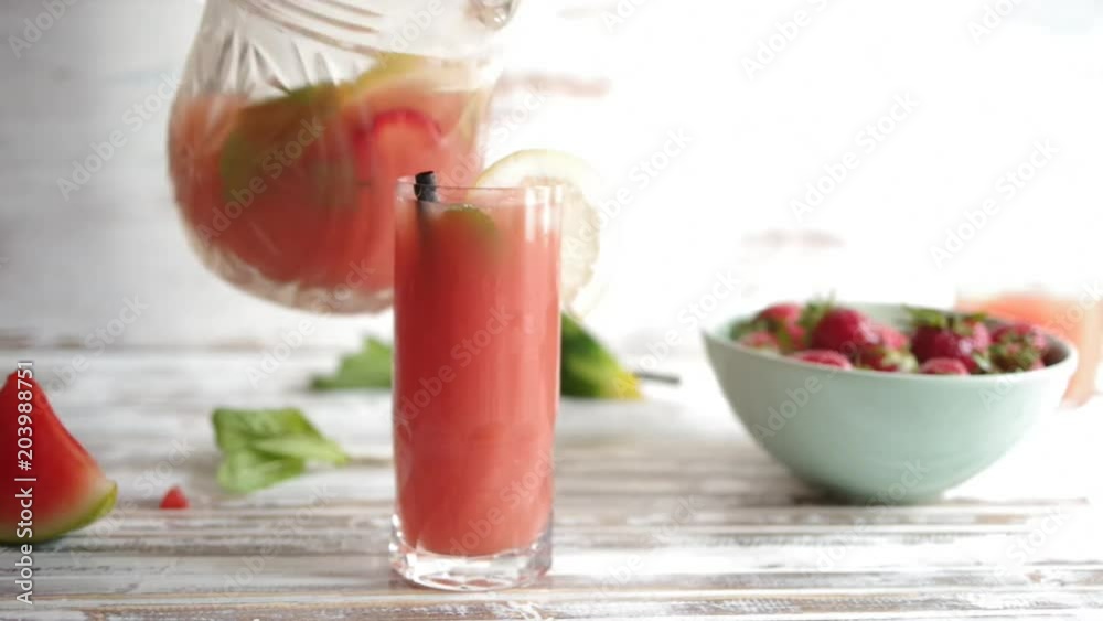 Pouring watermelon and fruit detox water, aqua fresca,
in a tall glass, against a white background with ingredients around, high key tonalty
Pouring watermelon and fruit detox water, aqua fresca,
in a tall glass, against a white background with ingredients around, high key tonalty