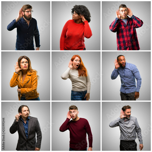 Group of mixed people, women and men holding hand near ear trying to listen to interesting news expressing communication concept and gossip