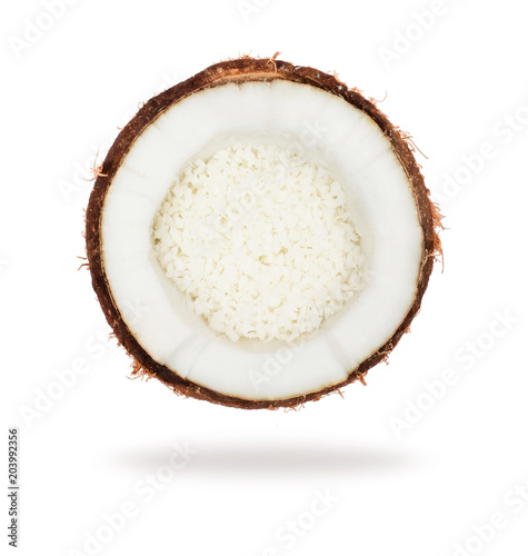 Coconut cut with shavings close-up on a white background