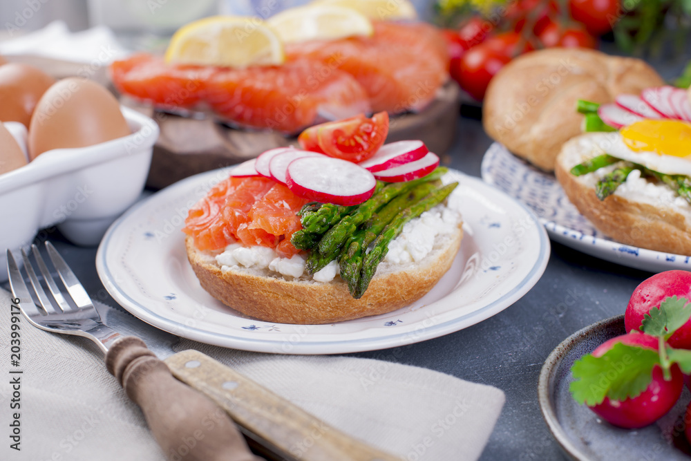 Bread with cheese, salmon and asparagus. Different Healthy Eating. Delicious breakfast for the family. Bread with cheese, salmon and asparagus. Different Healthy Eating. Delicious breakfast for the family.