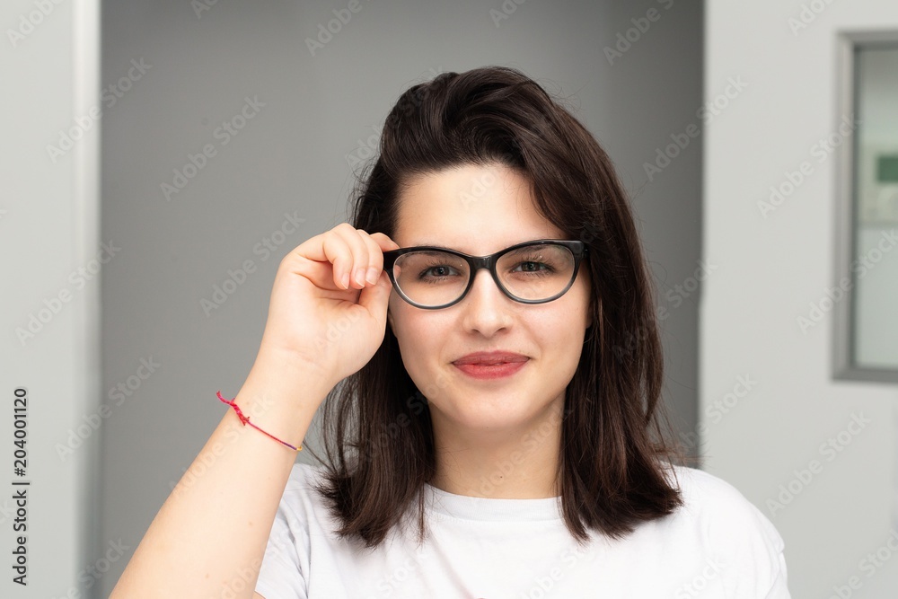 Portrait of smiling girl with glasses