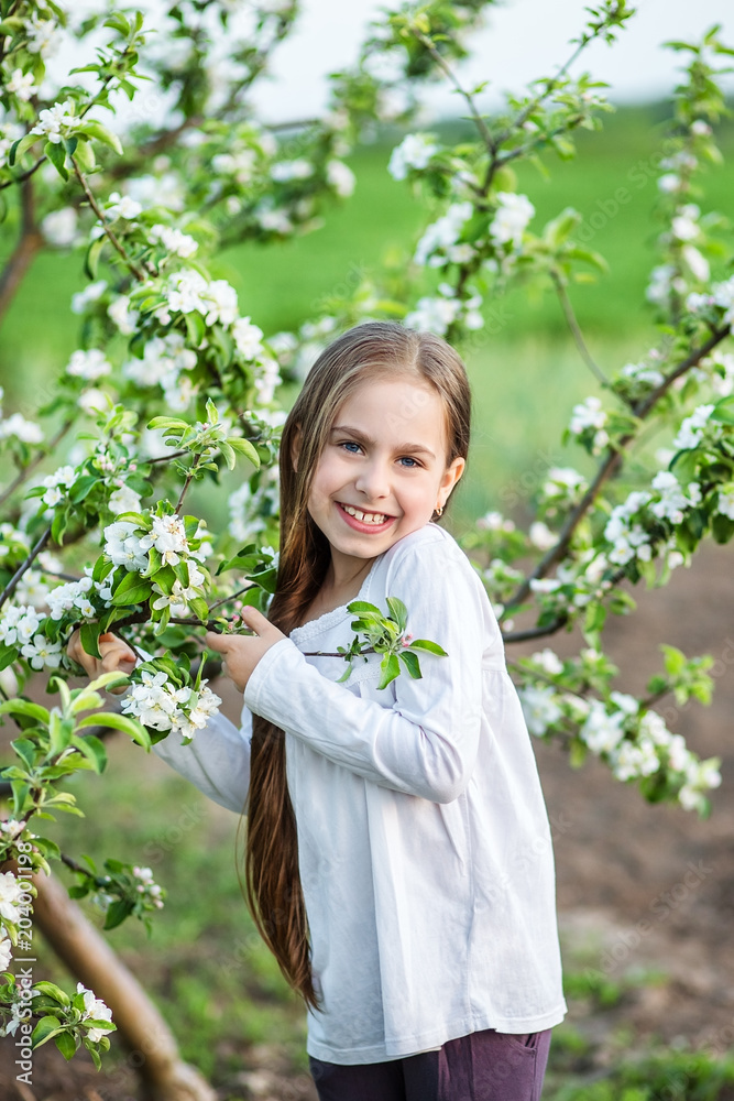 Portrait of cute girl in the spring garden Portrait of cute girl in the spring garden