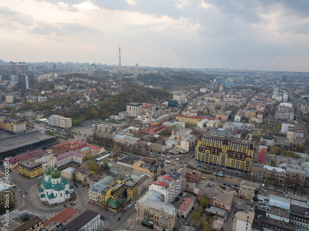 Fototapeta premium Aerial view of the Podol district and the church of St. Nicholas the Pristisk. Kiev, Ukraine