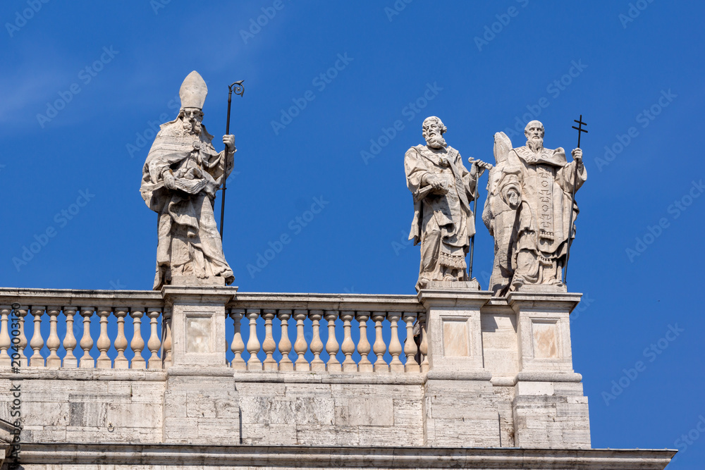 Architectural detail of Basilica of San Giovanni in Laterano (Basilica di San Giovanni in Laterano) in city of Rome, Italy