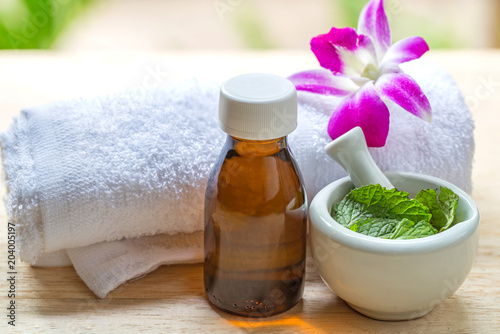 Spa and wellness and towels on wooden background. Relax and treatment therapy.