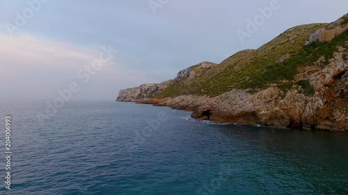 A view from the air to the coast and the sea near the city of Denia. District of Valencia, spring in Spain photo