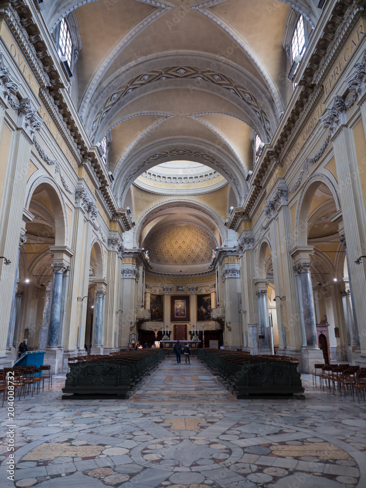 Central nave with barrel vaulted ceiling of the Duomo of Ravenna, Italy.