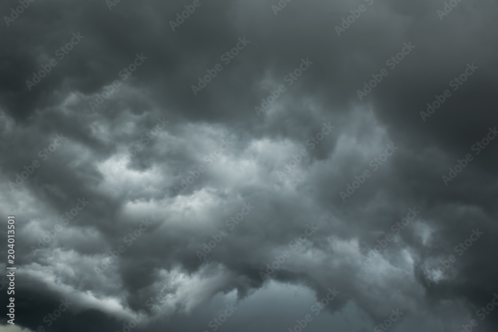 Dark clouds and thunderstorm with rainy, Dramatic black clouds in summer Dark clouds and thunderstorm with rainy, Dramatic black clouds in summer