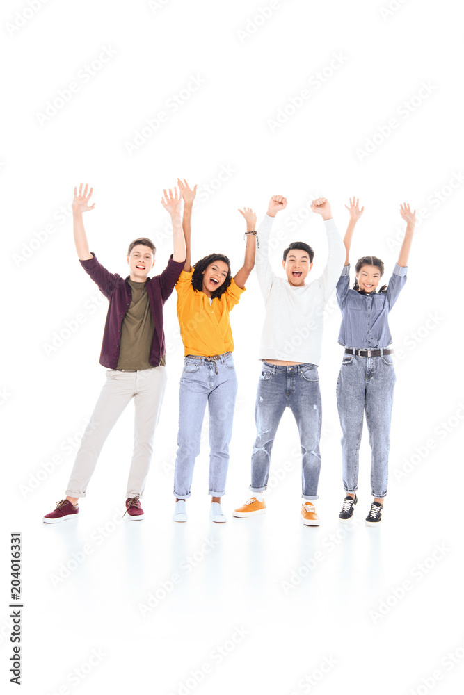 cheerful multicultural teenagers with outstretched arms isolated on white cheerful multicultural teenagers with outstretched arms isolated on white