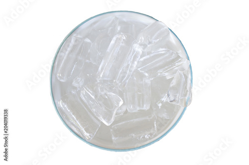ice cubes in the bowl on bamboo table