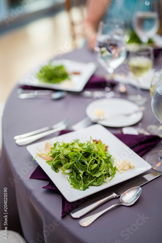 Obraz na plátne Fancy Salad on Dinner Table at Restaurant