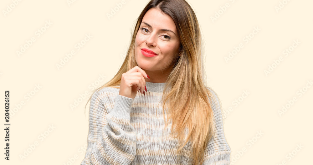 Young beautiful woman thinking and looking up expressing doubt and wonder Young beautiful woman thinking and looking up expressing doubt and wonder