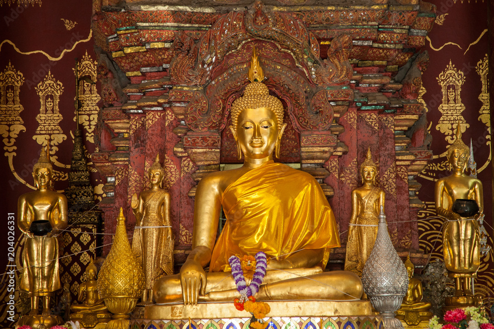 gold image buddha in the old temple Ayutthaya, Thailand 