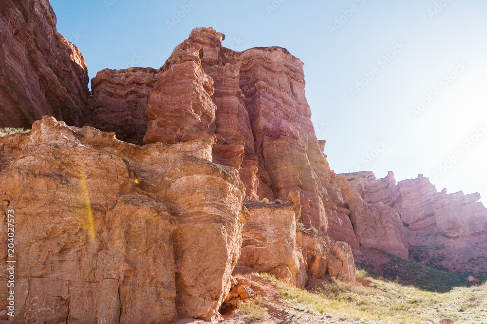 Charyn Canyon bottom view - geological formation consists of amazing big red sand stone. Charyn National Park. Kazakhstan.