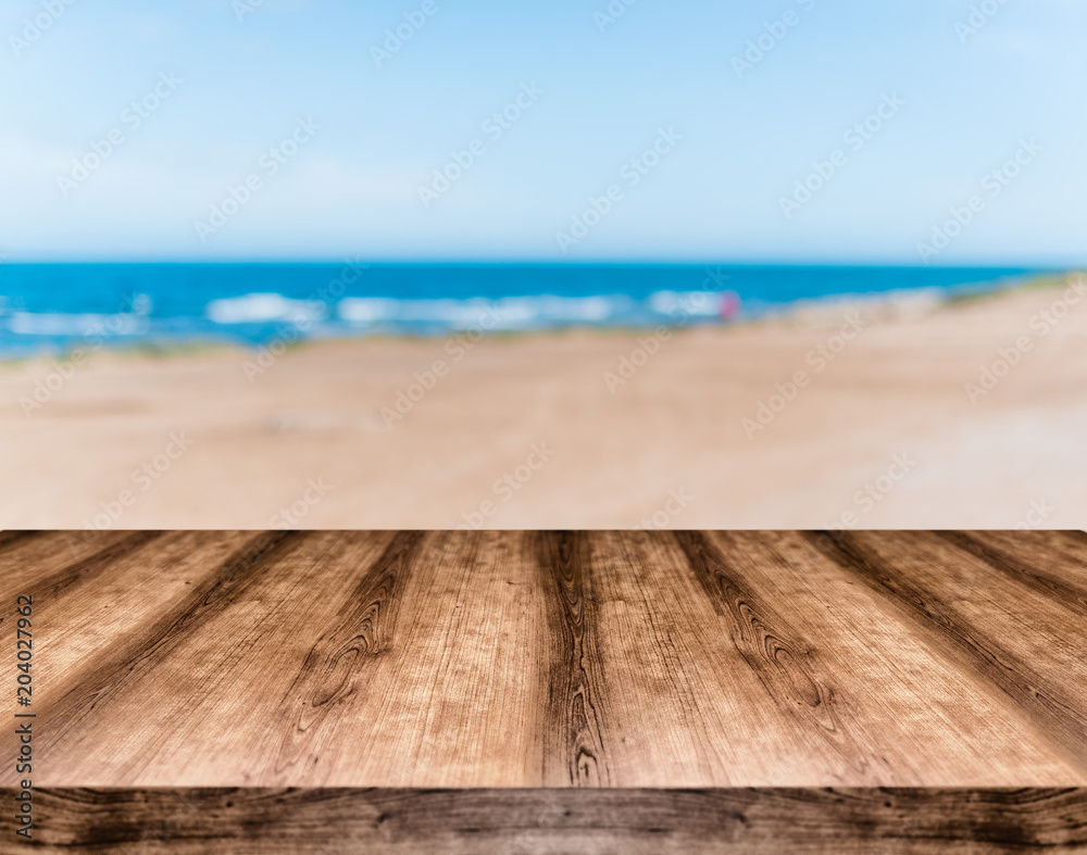 Wooden empty table board in front of blurred background. Can be used for display or montage any product. Mock up for display your product. Wooden empty table board in front of blurred background. Can be used for display or montage any product. Mock up for display your product.