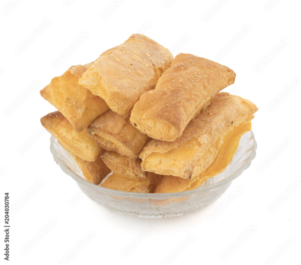 Crunchy Puff Snack Bakery Food Also Know As Khari Indian Tea Time Snack isolated on white background Crunchy Puff Snack Bakery Food Also Know As Khari Indian Tea Time Snack isolated on white background