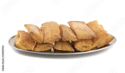Crunchy Puff Snack Bakery Food Also Know As Khari Indian Tea Time Snack isolated on white background