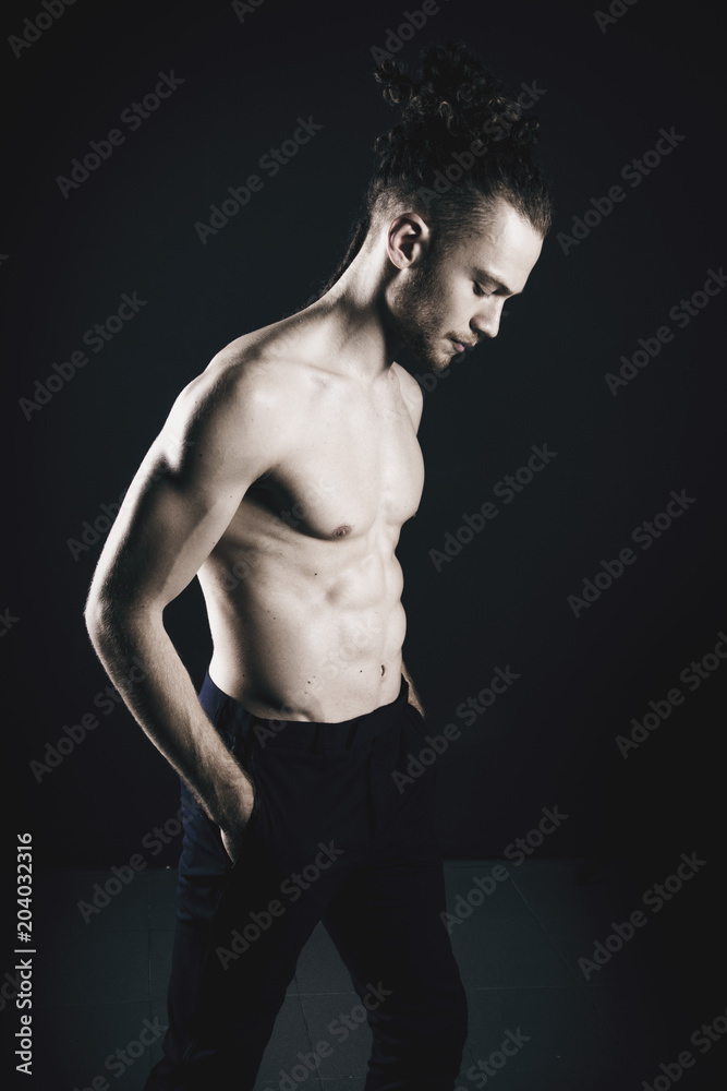 Young ginger topless man studio portrait Young ginger topless man studio portrait