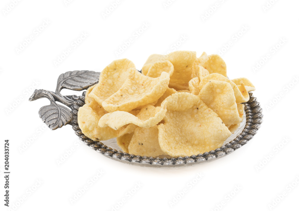 Indian Street Fried Heart Shaped Yellow Snack isolated on White Background Indian Street Fried Heart Shaped Yellow Snack isolated on White Background