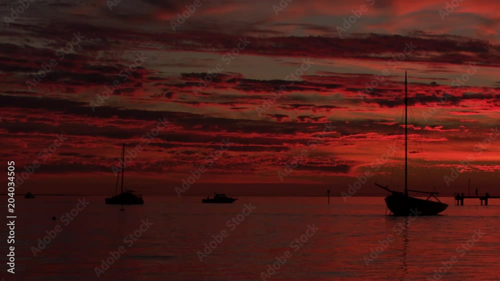 Slow motion sunset at Monkey Mia pier Slow motion sunset at Monkey Mia pier