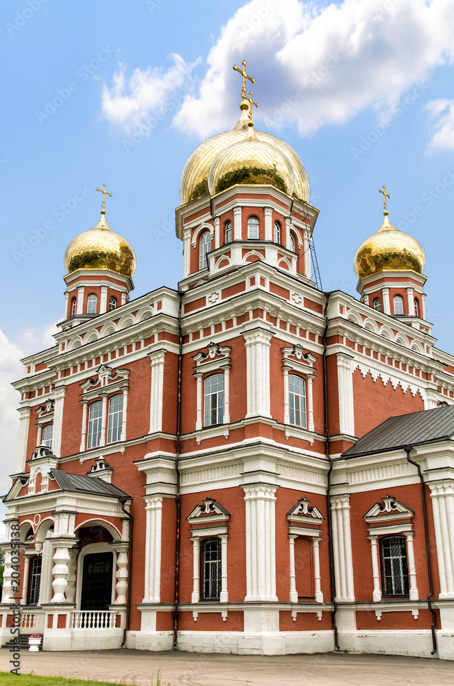 Temple of the Blessed Virgin with golden domes. Saratov city. Russian Federation