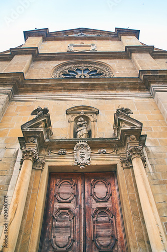 Entrance of Chiesa Collegiata dei SS Pietro e Stefano church in Bellinzona, Ticino, Switzerland