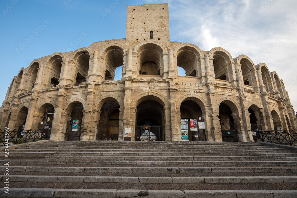 The Roman Amphitheater in the old town of Arles in Provence in the South of France.