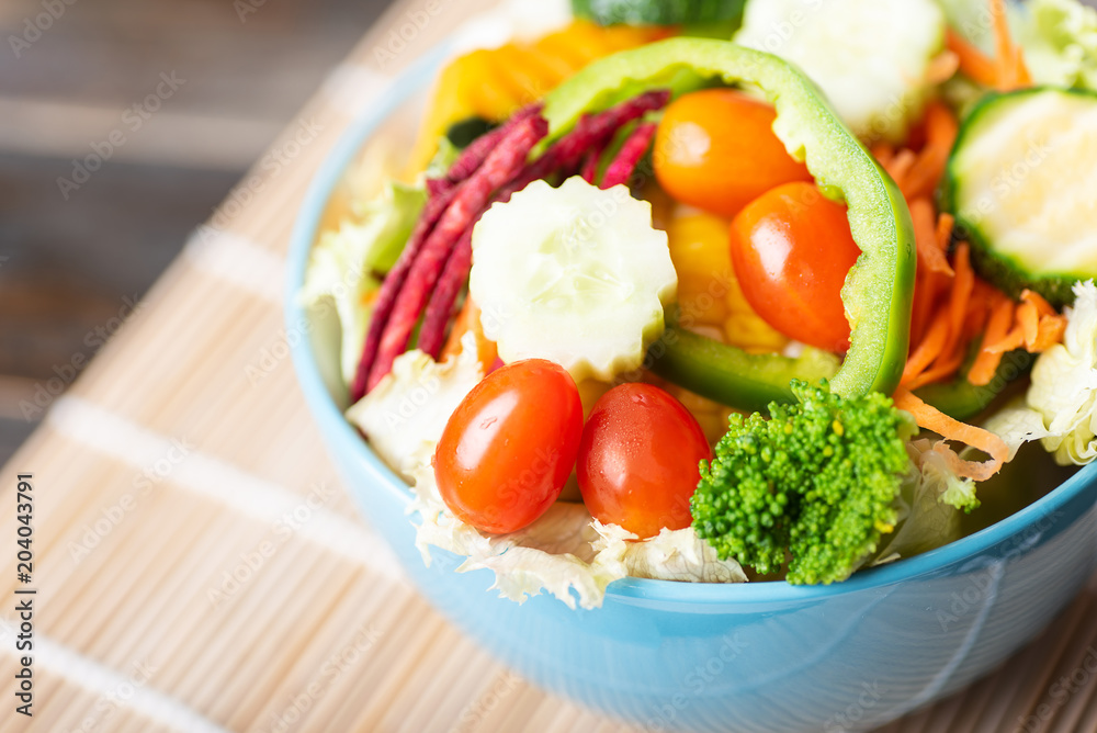 Vegetables salad in a bowl, healthy food Vegetables salad in a bowl, healthy food