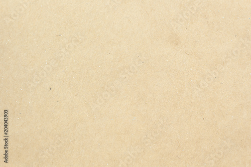 Brown craft cardboard paper sheet of recycle paper background and texture. 