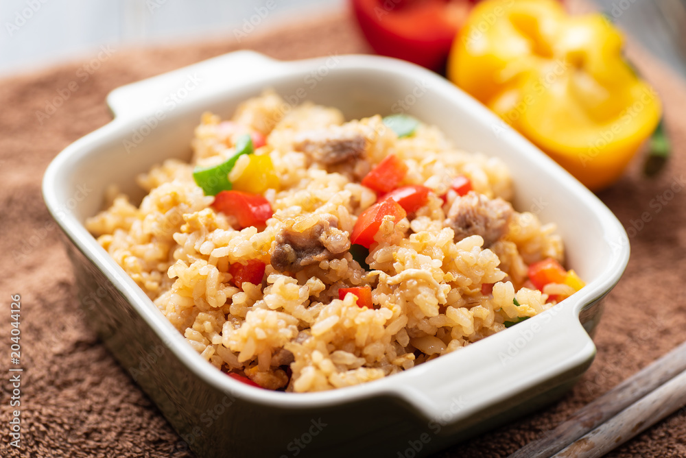 Fried rice with vegetables and pork, Asian cuisine Fried rice with vegetables and pork, Asian cuisine