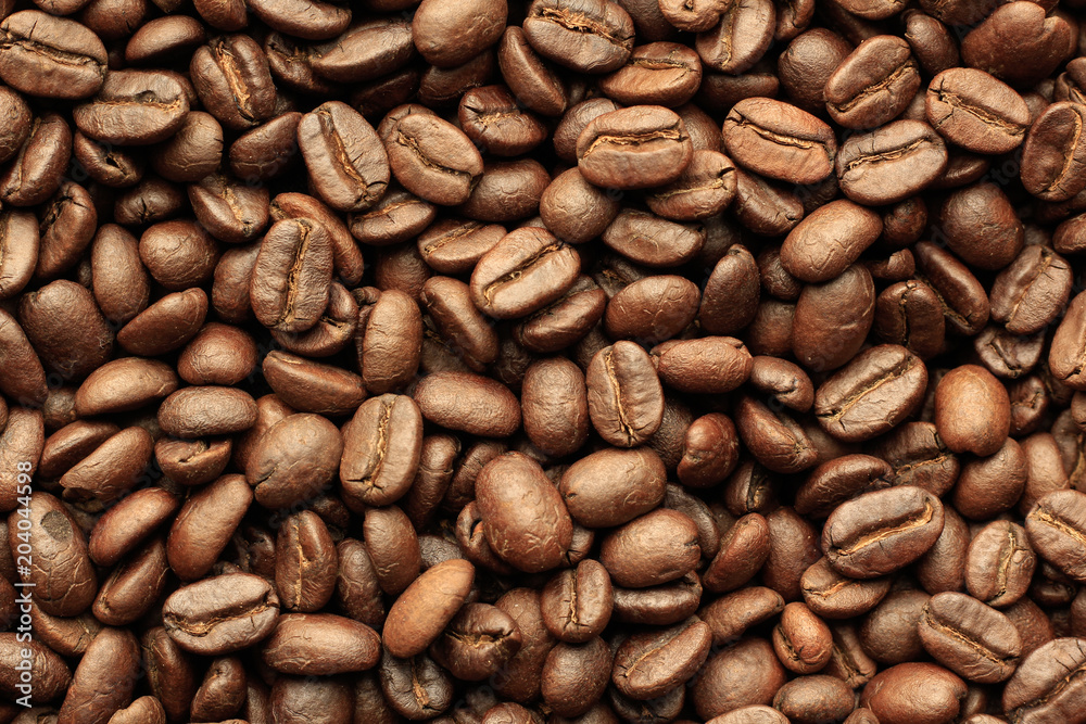 Naklejka premium Roasted Coffee Beans background texture. 