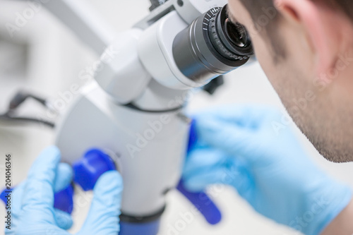 Professional modern microscope equipment at dental office