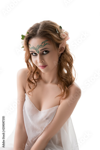 Sexy girl in the image of elf isolated shot