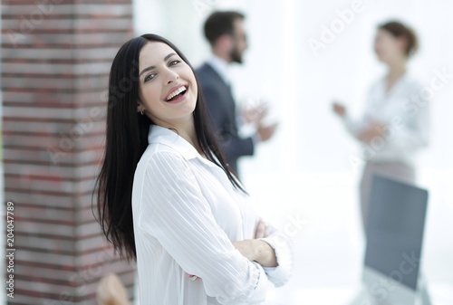 perspective successful young woman in the office