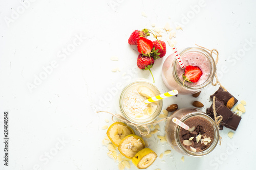 Banana chocolate and strawberry milkshakes
