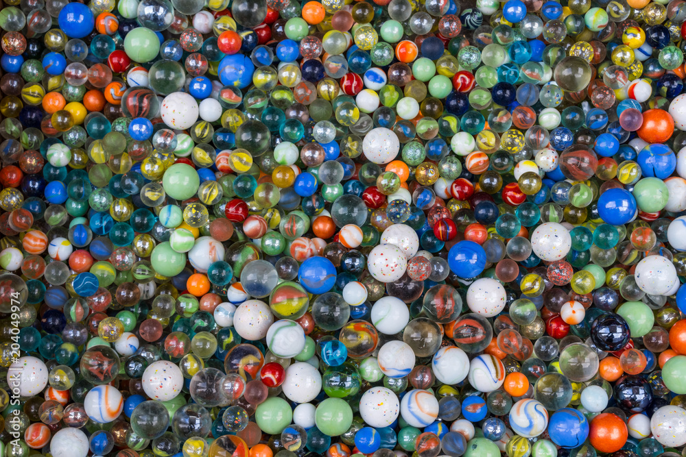 The background of diversity colorful glass marbles