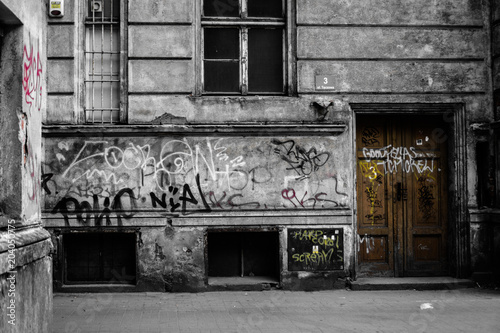 Dirty tagged old tenant houses in Poland photo