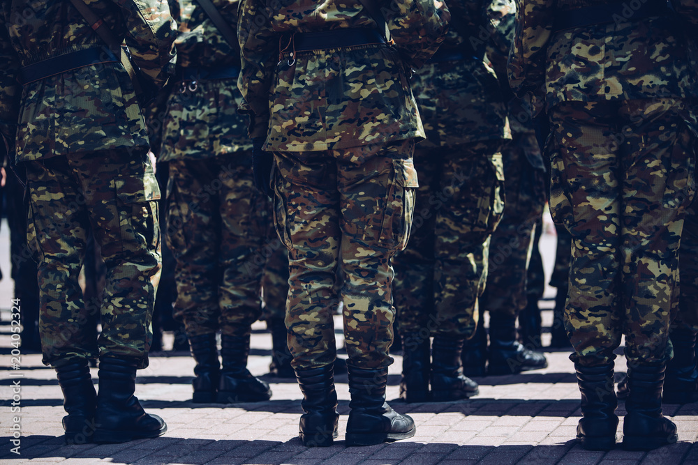 Soldiers in masking camouflage uniforms on parade Soldiers in masking camouflage uniforms on parade